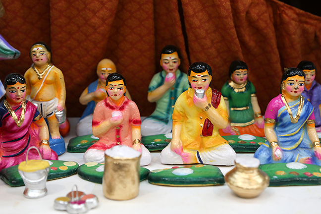 Bombe Mane A photograph of dolls at a wedding